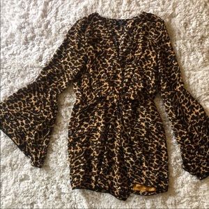 vici leopard print dress. Bell shaped sleeves